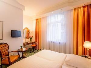 Postel nebo postele na pokoji v ubytování Hotel Palmenhof