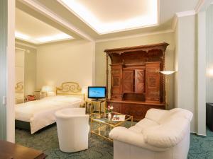 TV a/nebo společenská místnost v ubytování Hotel Palmenhof