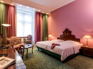Postel nebo postele na pokoji v ubytování Hotel Palmenhof