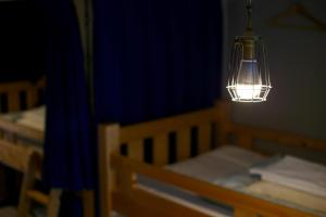 Postel nebo postele na pokoji v ubytování Greenwood Hostel