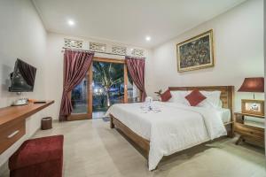 Jero Griya Ubud客房内的一张或多张床位