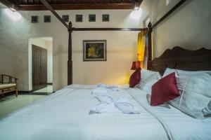 Jero Griya Ubud客房内的一张或多张床位
