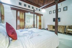 Jero Griya Ubud客房内的一张或多张床位