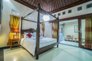 Jero Griya Ubud客房内的一张或多张床位