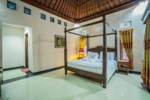 Jero Griya Ubud客房内的一张或多张床位