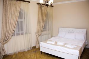 Voodi või voodid majutusasutuse Red Hotel Yerevan Center toas