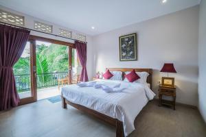 Jero Griya Ubud客房内的一张或多张床位