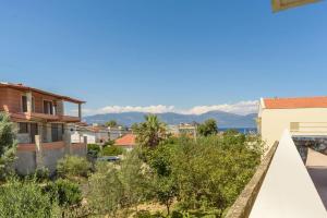 a view from the balcony of a house at An Edens Garden Near The Sea - Pansion Youli in Selianitika