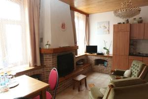 TV a/nebo společenská místnost v ubytování B&B Nollekes Winning