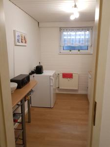 Kuchyň nebo kuchyňský kout v ubytování Ferienwohnung Mendig - Wasserschöpp