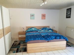 Postel nebo postele na pokoji v ubytování Ferienwohnung Mendig - Wasserschöpp