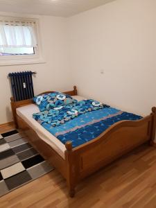 Postel nebo postele na pokoji v ubytování Ferienwohnung Mendig - Wasserschöpp