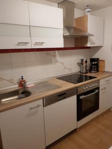 Kuchyň nebo kuchyňský kout v ubytování Ferienwohnung Mendig - Wasserschöpp