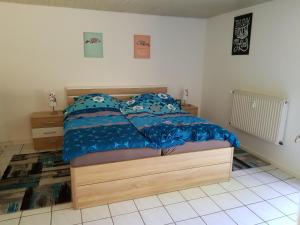 Postel nebo postele na pokoji v ubytování Ferienwohnung Mendig - Wasserschöpp