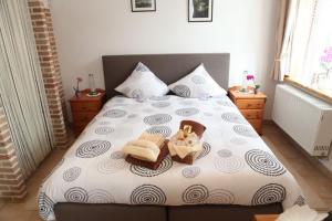 Postel nebo postele na pokoji v ubytování B&B Nollekes Winning