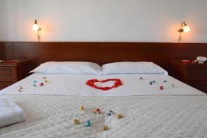 Postel nebo postele na pokoji v ubytování Castelvetere Hotel