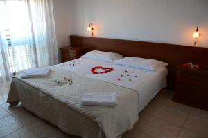 Postel nebo postele na pokoji v ubytování Castelvetere Hotel