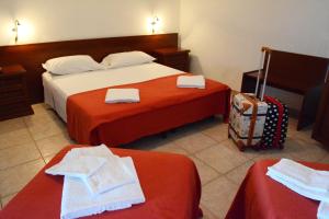 Postel nebo postele na pokoji v ubytování Castelvetere Hotel + 37 fotografií