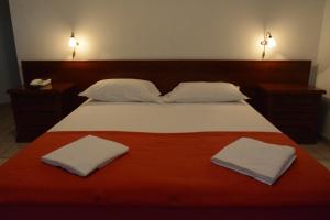 Postel nebo postele na pokoji v ubytování Castelvetere Hotel