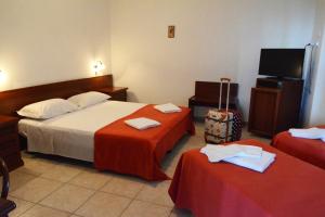 Postel nebo postele na pokoji v ubytování Castelvetere Hotel