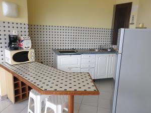 Кухня или кухненски бокс в Agréable Studio vue mer au Trois Îlets