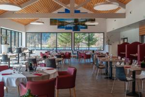En restaurant eller et andet spisested på Camping Base de Loisirs du Lac de la Moselotte