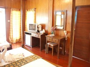Postel nebo postele na pokoji v ubytování Sayang Beach Resort Koh Lanta