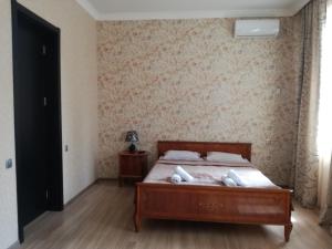 Postelja oz. postelje v sobi nastanitve Guest House Kakheti