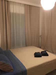 A bed or beds in a room at Casa vacanze Circle House Santa Filomena