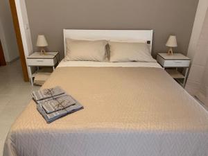 A bed or beds in a room at Casa vacanze Circle House Santa Filomena