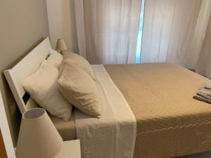 A bed or beds in a room at Casa vacanze Circle House Santa Filomena