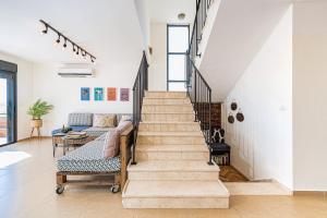 Posezení v ubytování Mitzpush Premium Villa