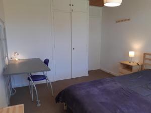 Postel nebo postele na pokoji v ubytování Chamrousse 1750 - Le Taillefer - Appartement classé 3 étoiles