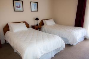 Cama o camas de una habitación en Hotel Mejillones