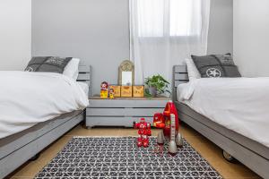 Postel nebo postele na pokoji v ubytování Mitzpush Premium Villa