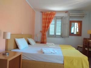 Postel nebo postele na pokoji v ubytování Villa Eleni
