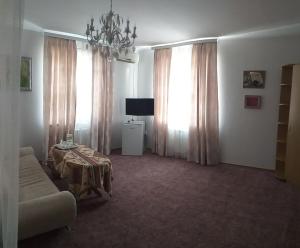 TV a/nebo společenská místnost v ubytování Fiesta