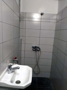 Kúpeľňa v ubytovaní Art apartment Syngrou