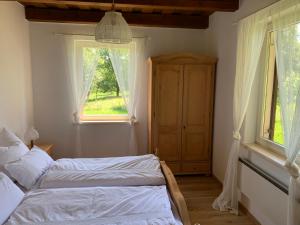 Ein Bett oder Betten in einem Zimmer der Unterkunft Urlaub im Weingarten