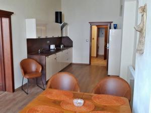 Kuchyň nebo kuchyňský kout v ubytování Apartmány na Trojmezí, byt Markéta
