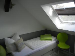 Cama ou camas em um quarto em Gutshof Zum Adlernest
