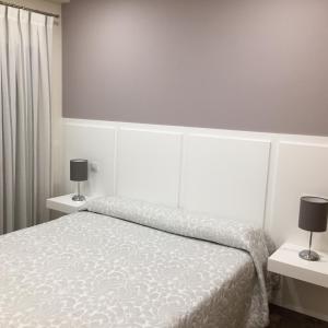 Posteľ alebo postele v izbe v ubytovaní Hostal Infantes