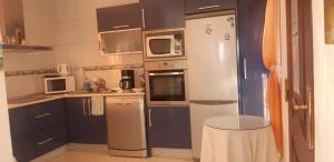 Kuchnia lub aneks kuchenny w obiekcie Cozy rooms in terraced house