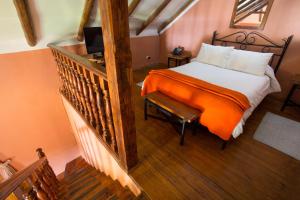 Łóżko lub łóżka w pokoju w obiekcie Posada del Puruay