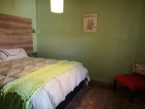 Una cama o camas en una habitación de Establecimiento Rural El Chañar
