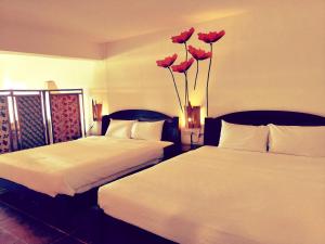 A bed or beds in a room at Mishe B&B也可包棟民宿