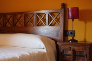 A bed or beds in a room at El Rincón Del Juez