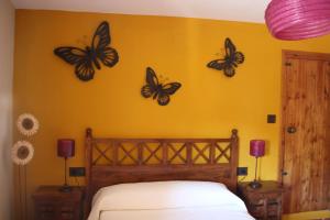 A bed or beds in a room at El Rincón Del Juez