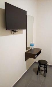 TV a/nebo společenská místnost v ubytování Hotel Pangkor SJ