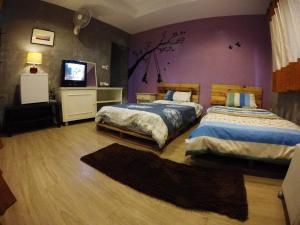 Postel nebo postele na pokoji v ubytování Payi Resort